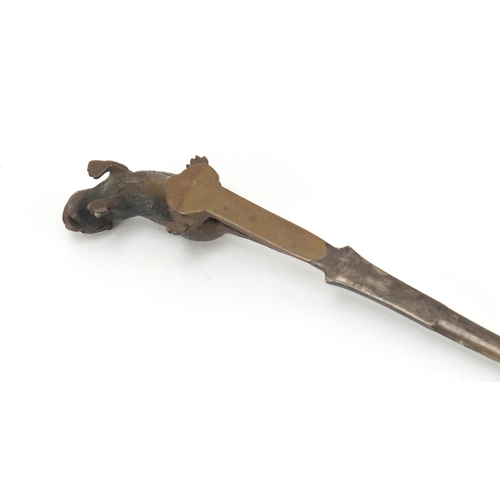 52 - Patinated bronze otter design letter opener, 21.5cm in length