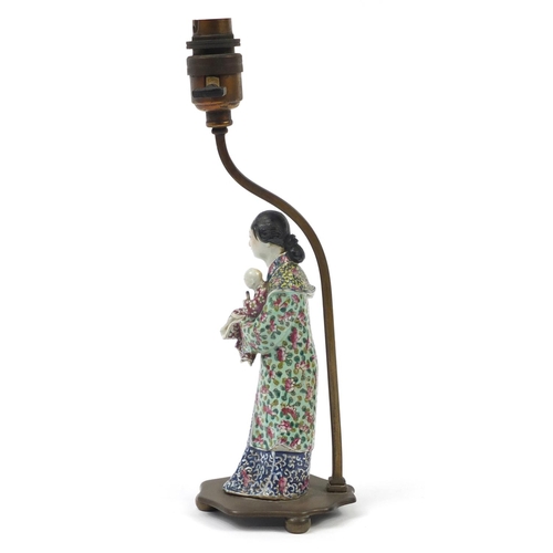 48 - Chinese porcelain table lamp with bronze mount, in the form of a mother holding a child, hand painte... 
