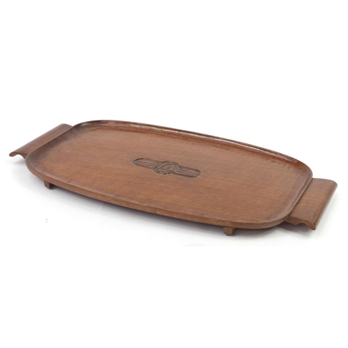 1450 - Military interest hardwood tray with twin handles and carved crest, 60cm in length