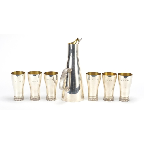 525 - House of Lawrian for Christopher N Lawrence, contemporary silver seven piece drinking set comprising... 