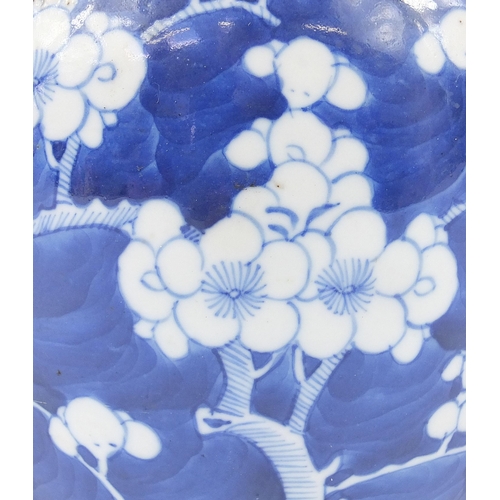 19 - Chinese blue and white porcelain hand painted with prunus flowers comprising two cylindrical vases a... 