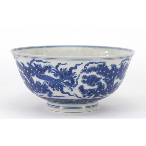 4 - Chinese blue and white porcelain footed bowl finely hand painted with mythical animals above crashin... 