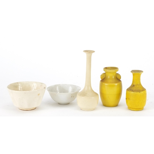 16 - Chinese porcelain comprising two yellow vases, blanc de chine bowls and blanc de chine vase, the lar... 
