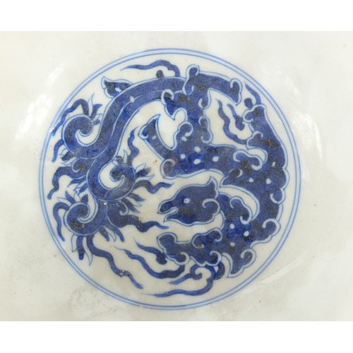 4 - Chinese blue and white porcelain footed bowl finely hand painted with mythical animals above crashin... 