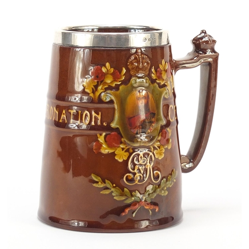 38 - Royal Doulton tankard with a silver collar commemorating George V coronation, 12cm high