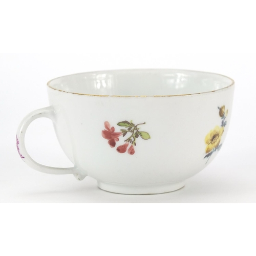 46 - Meissen, 19th century porcelain cup and saucer hand painted with flowers, the saucer 13.5cm in diame... 