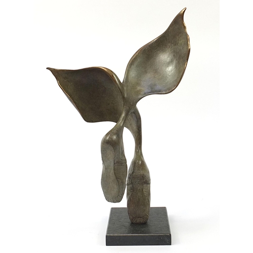 36 - Bob Allen, patinated bronze study of winged ballet shoes raised on a rectangular granite base, 60.5c... 