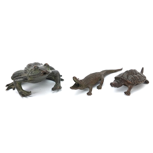 Three Japanese patinated bronze animals comprising frog, tortoise and crocodile, the largest 8.5cm in length