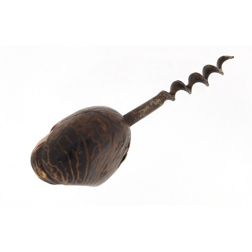 10 - Coquilla nut corkscrew carved with a face, 11cm in length