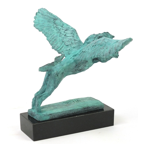40 - Mark Coreth for McArthur Glen Group, Verdigris bronze study of a winged lion raised on a rectangular... 