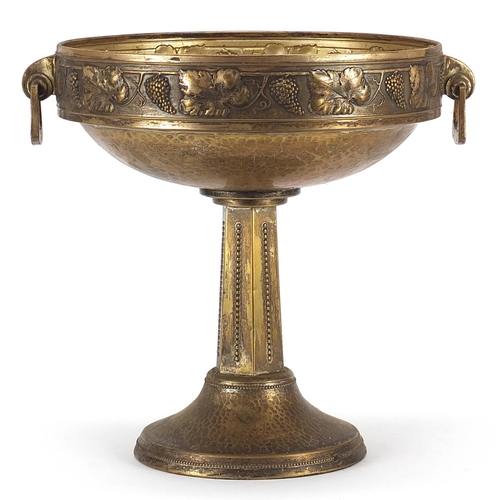 52 - Art Deco bronzed centrepiece with twin handles decorated in relief with leaves and berries, 29cm hig... 