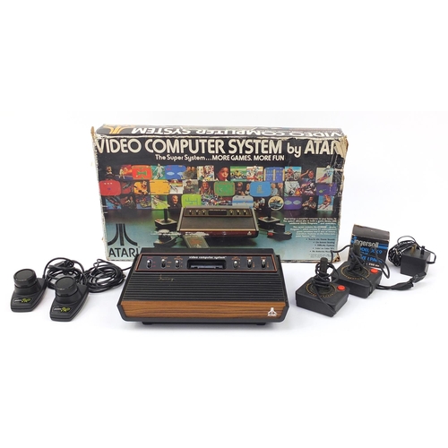 Vintage Atari video computer system with box, model CX-2600 | Barnebys