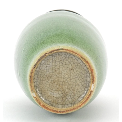 58 - Chinese porcelain crackle glazed vase having a green monochrome glaze, 15cm high