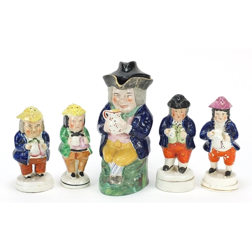 134 - 19th century Staffordshire pottery including four figural sifters, the largest 20cm high