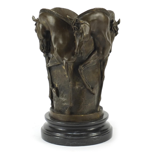 39 - Art Deco style Maharajah Thoroughbred bronze wine cooler raised on a black marble base, 30.5cm high