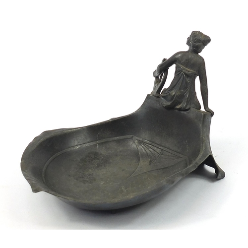 14 - WMF, German Art Nouveau pewter dish surmounted with a female holding an instrument, numbered 289, 25... 