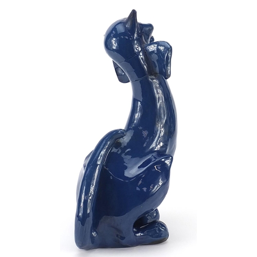 5 - C H Brannam Barum pottery seated cat having a blue glaze, 30cm high