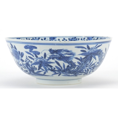 8 - Chinese blue and white porcelain bowl hand painted with a dragon amongst flowers, four figure charac... 
