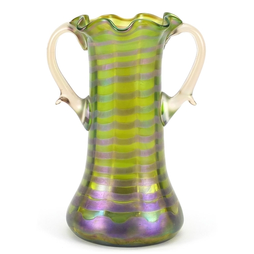 20 - Attributed to Loetz, Art Nouveau iridescent green glass vase with twin handles, 23cm high