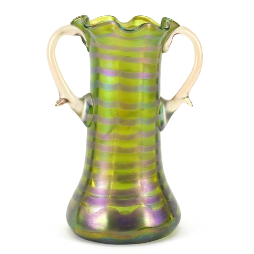 20 - Attributed to Loetz, Art Nouveau iridescent green glass vase with twin handles, 23cm high