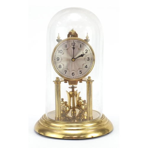 Brass anniversary clock with glass dome, 30cm high Barnebys