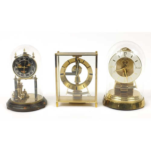 Two anniversary clocks with glass domes - auctions & price archive