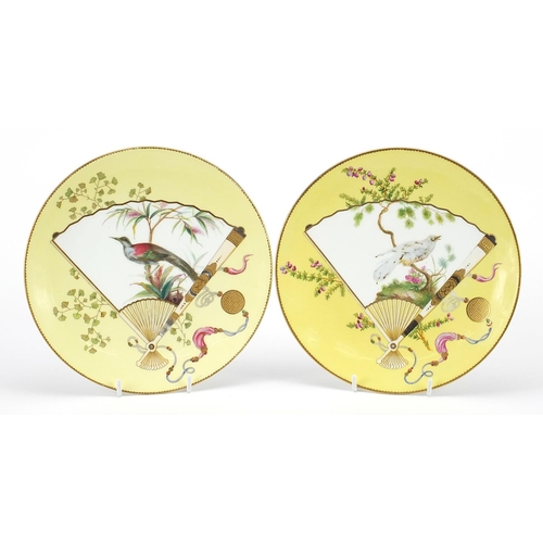 35 - Christopher Dresser for Minton, pair of Victorian Aesthetic plates hand painted with birds and flowe... 