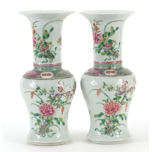 40 - Pair of Chinese porcelain vases hand painted in the famille rose palette with flowers, each 25cm hig... 