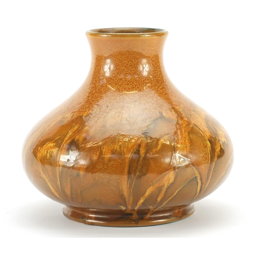 53 - William Moorcroft pottery vase having a mottled orange glaze, 15.5cm high