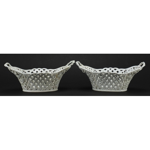 4 - Meissen, Pair of German porcelain pierced baskets with twin handles, each 26.5cm wide