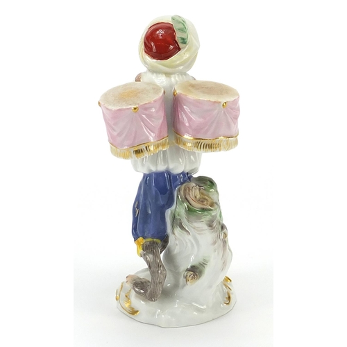 2 - Meissen, German porcelain figure of a monkey carrying two drums, numbered 60003 to the base, 14cm hi... 