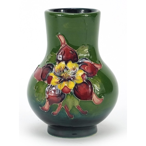 58 - Moorcroft pottery vase hand painted with flowers, 11cm high