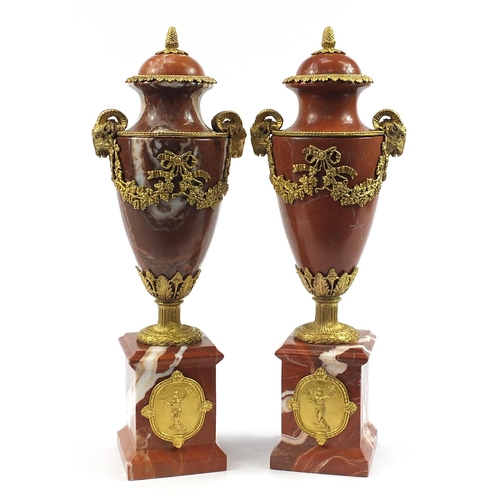 17 - Large pair of French Empire style rouge marble urns with gilt bronze rams head handles and mounts, 5... 