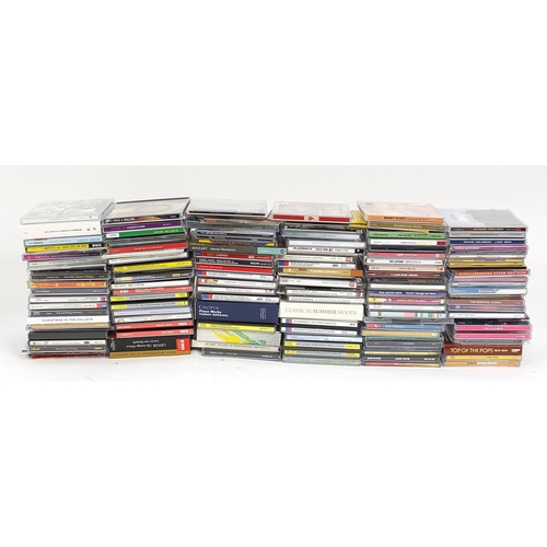Quantity of CD's to include The Instant Party, Top of the Pops, Madness, Pavaroti Live, Party CD's, classical Summer Moods and Take That The Ultimate Collection
