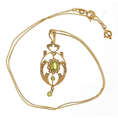851 - Art Nouveau 9ct gold peridot and seed pearl pendant on a 18ct gold necklace housed in a Le Roy et Fi... 