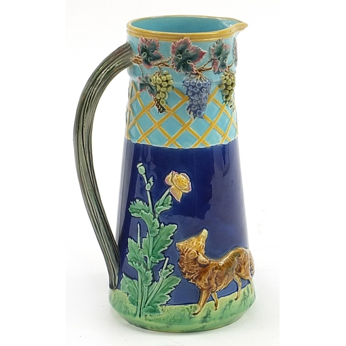 45 - Westhead and Moore, Victorian Majolica jug decorated in relief with two foxes and berries, lozenge m... 