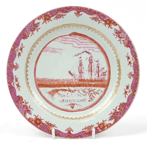 33 - Chinese pink monochrome porcelain plate hand painted with a rigged ship, inscribed Dus Leydons Vrien... 