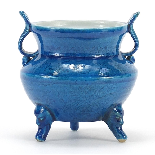 Chinese blue glazed porcelain tripod censer with twin handles incised with mythical animals, six figure character marks to the base, 12.5cm high