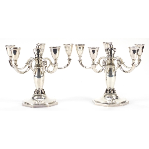 1 - C C Hermann, pair of Danish 925S sterling silver five branch candelabras retailed by Long's Jeweller... 