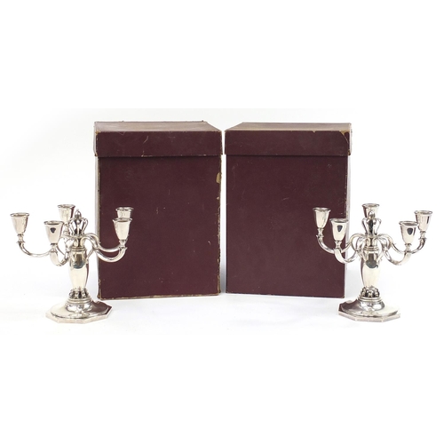 1 - C C Hermann, pair of Danish 925S sterling silver five branch candelabras retailed by Long's Jeweller... 