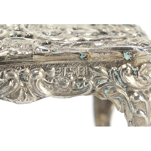 12 - Silver doll's house bench and table embossed with Putti and figures, Birmingham and London import ma... 