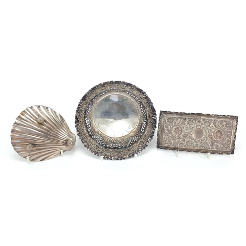 20 - Silver items comprising pierced and embossed bonbon dish, shell shaped dish and rectangular tray emb... 
