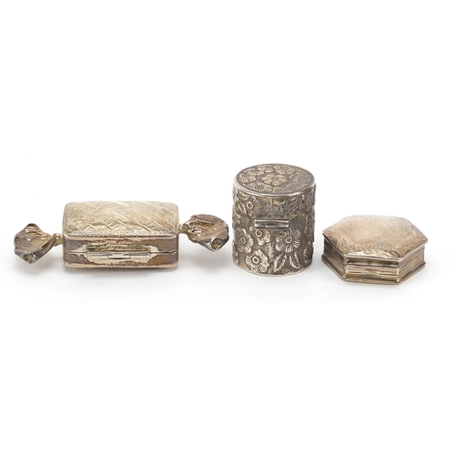 54 - Three silver trinket and patch boxes, one with embossed decoration, the largest 6.2cm wide, total 36... 