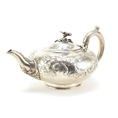 13 - Daniel & Charles Houle, Victorian silver teapot embossed with flowers and blank cartouches, London 1... 