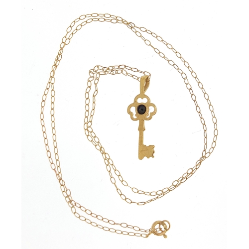49 - Unmarked gold sapphire key pendant, (tests as 9ct gold) on a 9ct gold necklace, 2cm high and 40cm in... 