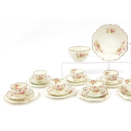 55 - Edwardian teaware decorated with flowers including trios, milk jug and sandwich plate, the largest 2... 