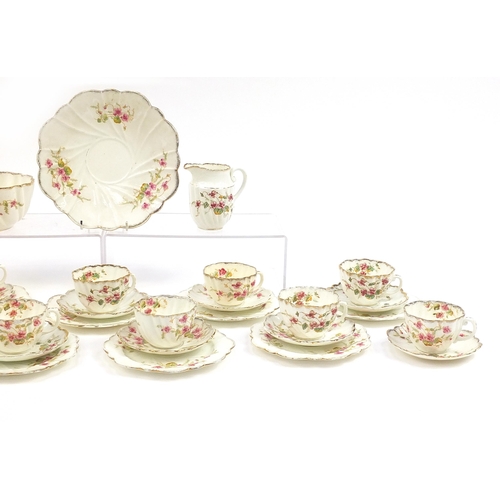 55 - Edwardian teaware decorated with flowers including trios, milk jug and sandwich plate, the largest 2... 