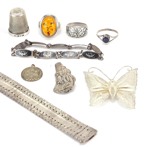 19 - Silver jewellery including Siam niello work bracelet, filigree butterfly brooch, rings and a flatten... 