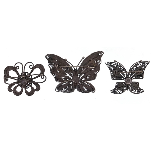 17 - Three silver and enamel butterfly brooches, each marked S925, the largest 5.2cm wide, total 19.7g