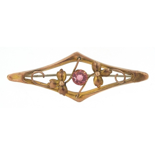 14 - Art Nouveau 9ct gold bar brooch set with a pink stone, 4.8cm wide, 1.6g